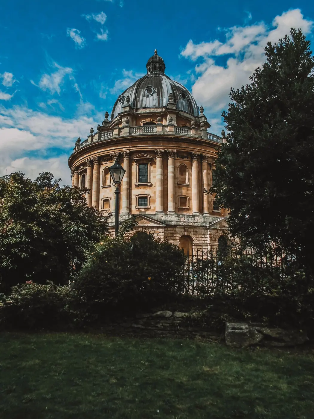 The Radcliffe Camera in Oxford framed by trees